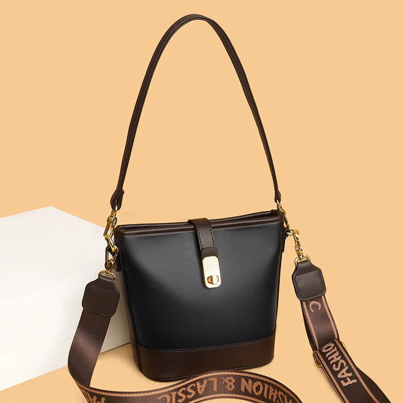 Korean style black bucket bag with multiple compartments and double shoulder straps