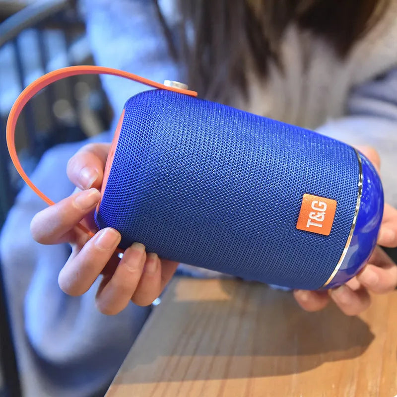 TG107 fabric Bluetooth portable speaker in blue colour with front relief spinning wheel design
