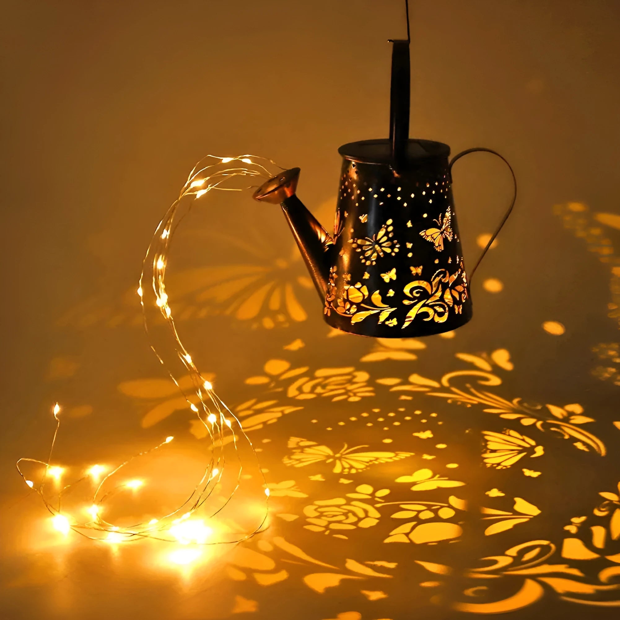 Solar-powered iron garden lamp with a tapered butterfly pattern emitting warm white light.