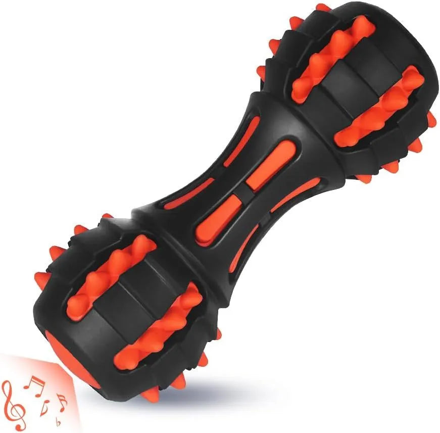 Red dumbbell-shaped durable rubber dog toy for aggressive chewers with a squeaker inside.