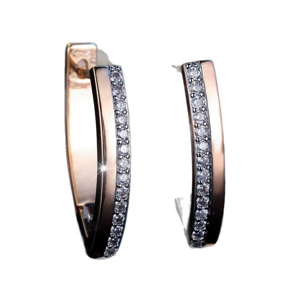 Women's V-shaped geometric ear clips in champagne gold white diamond finish