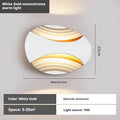 Modern aluminium wall lamp in metallic finish with wall-mounted design for bedroom bedside lighting