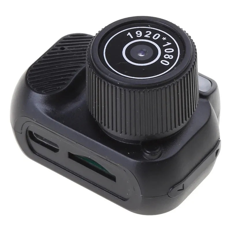 Black retro mini video camera with built-in screen showing 1080p HD recording