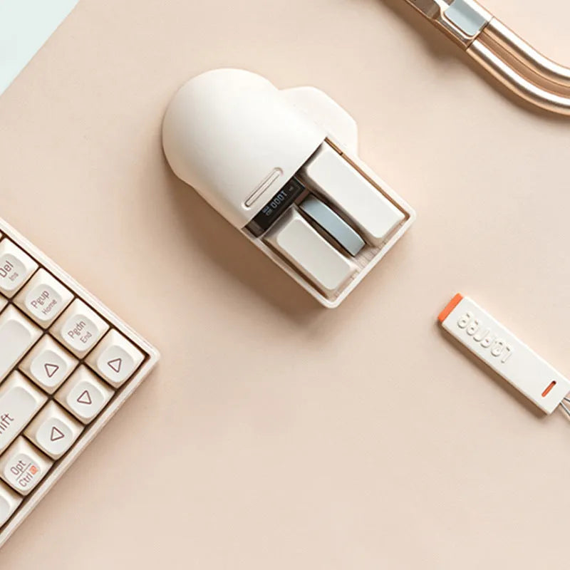Xiaoqiao Three Mode Wireless Mouse in Tofu Colour with USB receiver and Type-C cable.