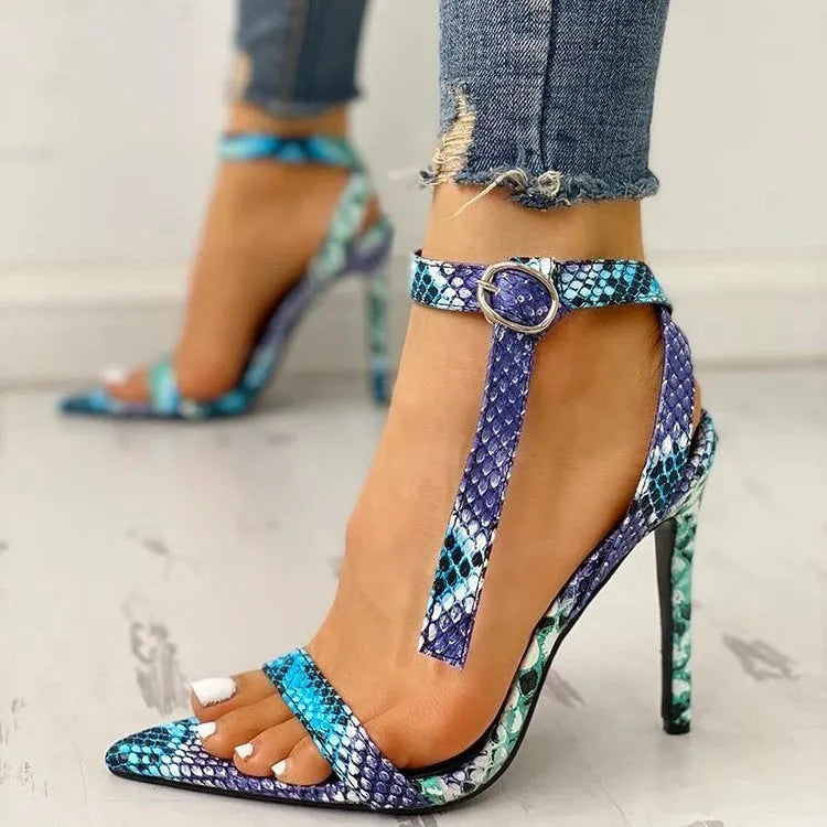 Blue women's high heel sandals with an ankle strap buckle and hollow-out detail.