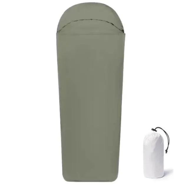 Blue mummy-style nylon camping sleeping bag shown rolled, highlighting its tapered 210cm length and compact design.