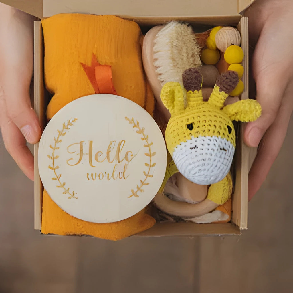 Baby teething toy gift set with gauze blanket, wooden milestone, bell, beech gum and tire brush