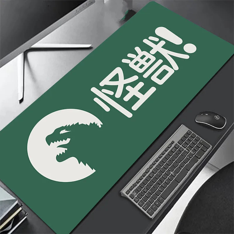 All black extra long mouse pad with precision overlock stitching on a desk