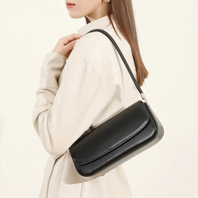 Genuine leather women's saddle bag in caramel, horizontal square shape with double shoulder straps