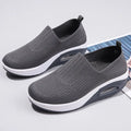 Women's mesh running shoes with air cushion sole in beige colour showing round toe and elastic lace design
