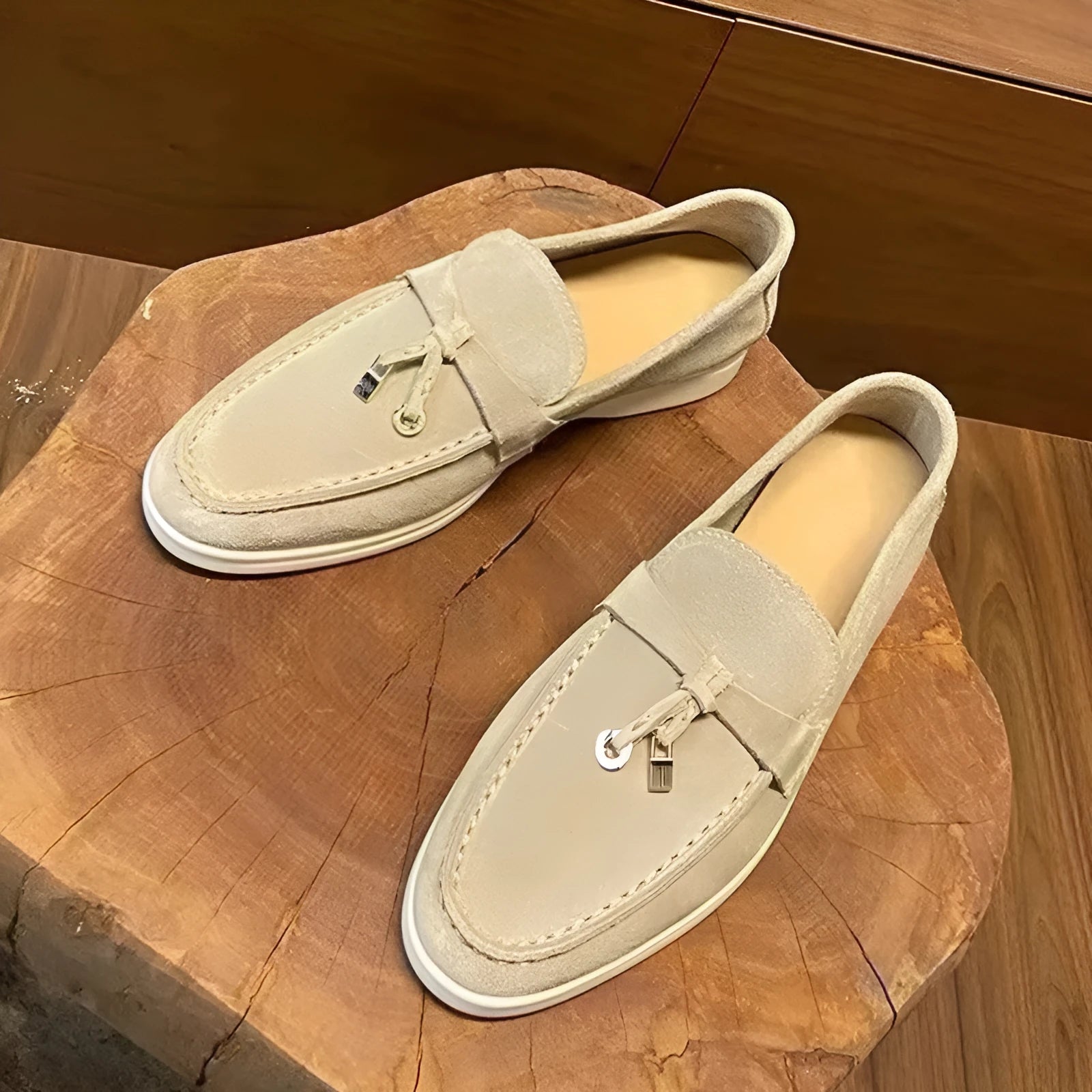 Gommino slip-on loafers with rubber sole and high-top design in neutral colours