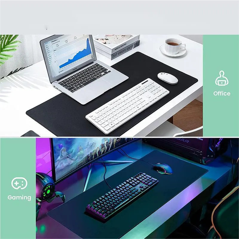 Large black and white gaming mouse pad with non-slip rubber bottom and cloth cover on a desk