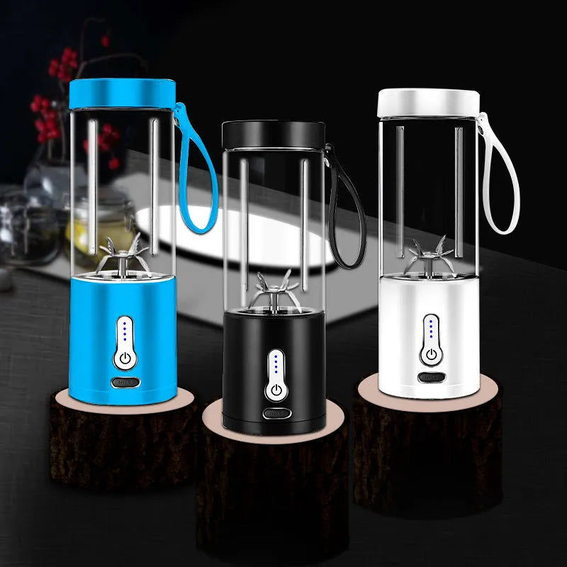 Portable hand-operated rechargeable blender with juice cup in black, white, blue, and rose red colours