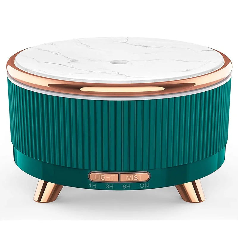 Round wood grain ultrasonic aroma diffuser with 500ml tank, five colour options, on a desktop