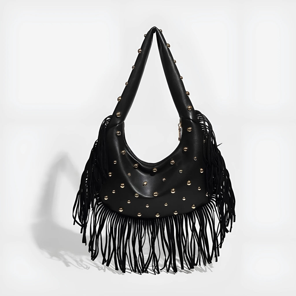 Retro tassel shoulder handbag in black colour showing decorative detail and shoulder strap
