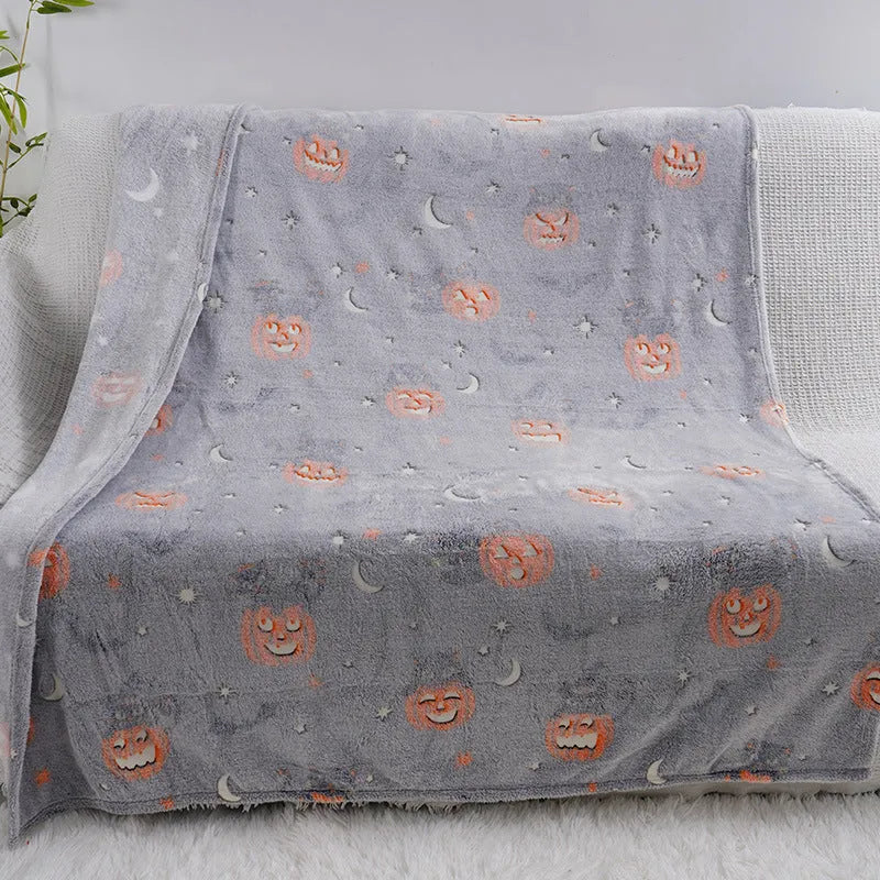 Cartoon-patterned flannel blanket draped over a child's air conditioning unit.