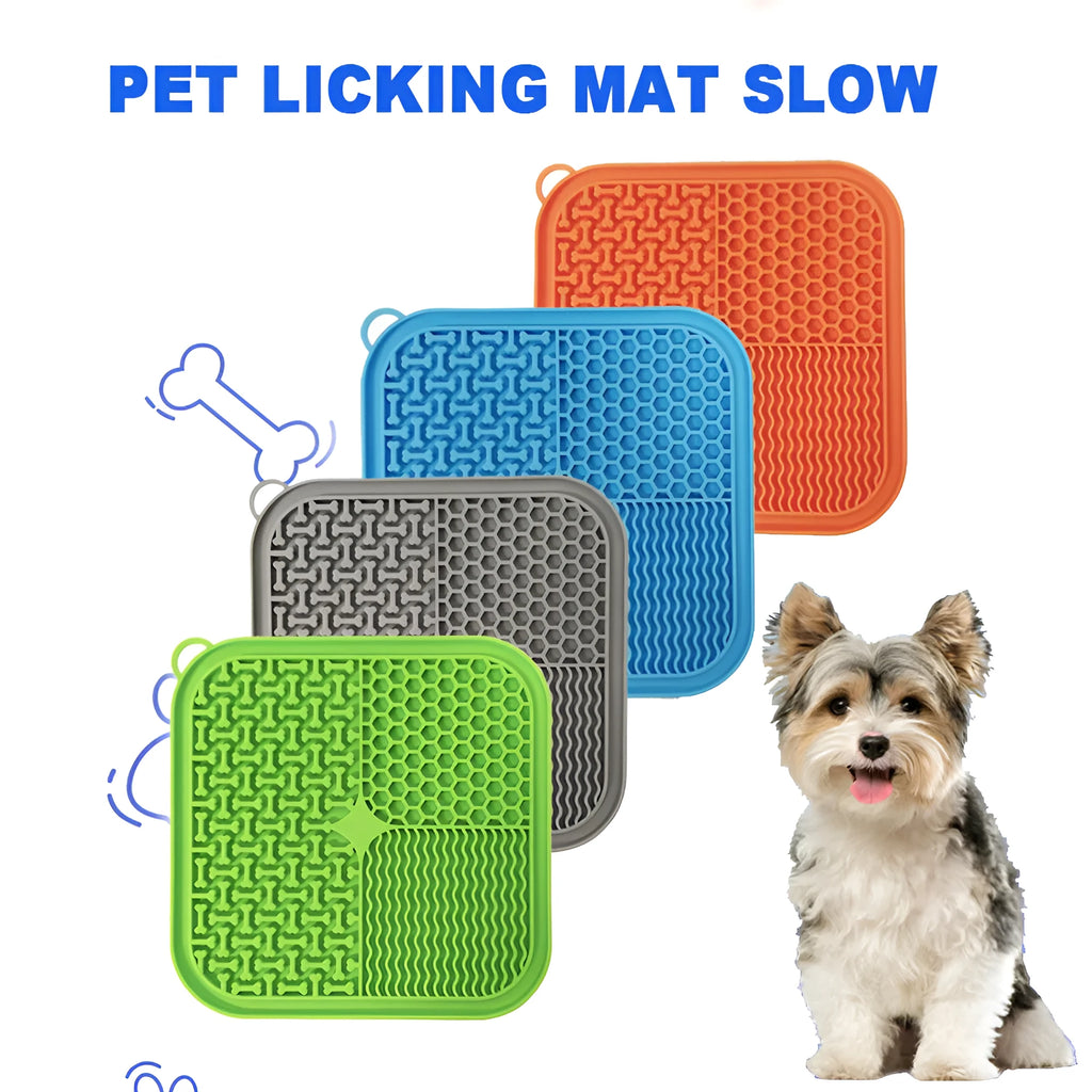 Orange, grey, blue and green silicone dog licking mat with suction cups on back measuring 20x20cm