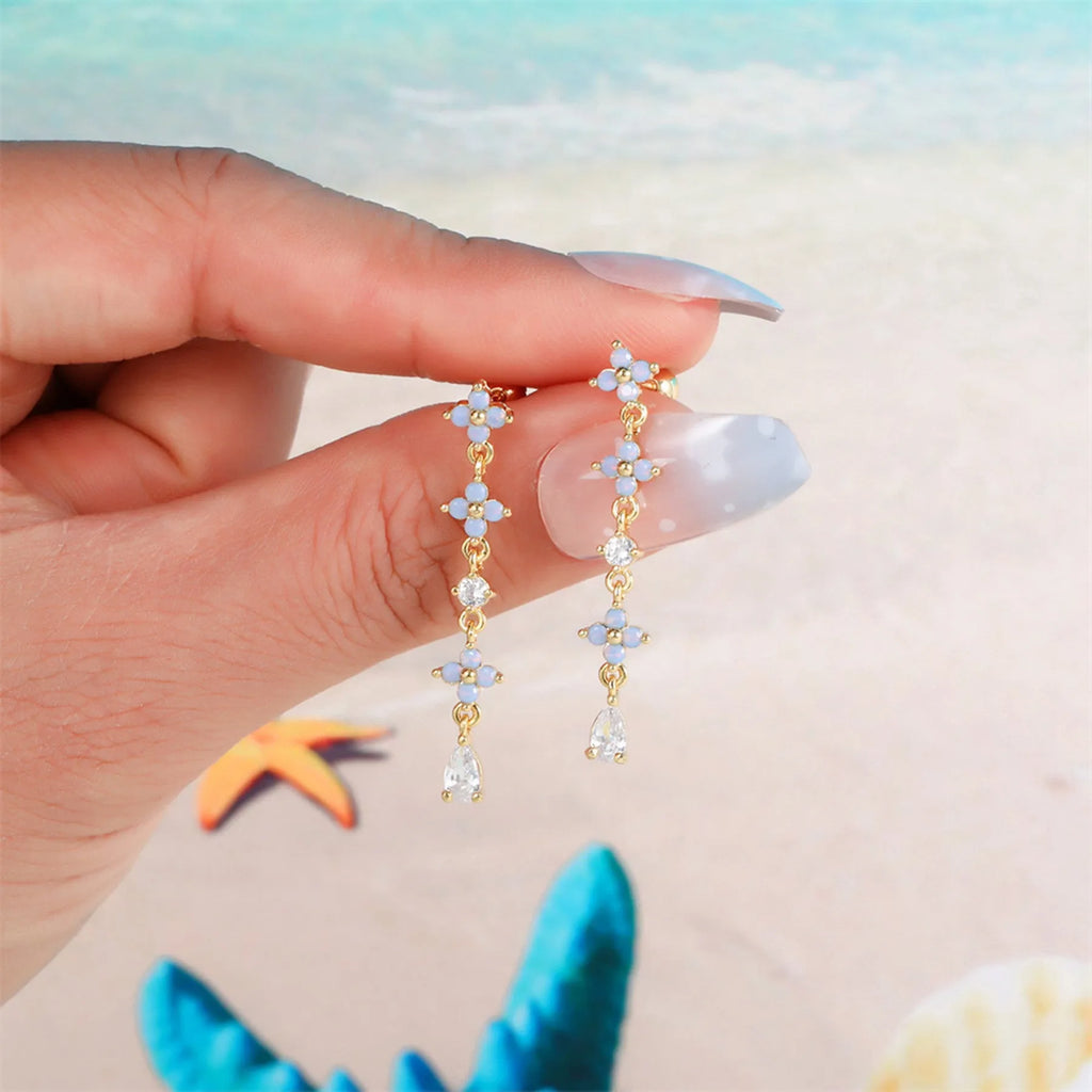 Korean-style tassel flower screw ball ear cartilage piercing in brass with floral design