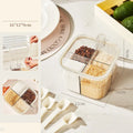 White rotating kitchen storage bucket with four-compartment spice box lid next to cutlery.