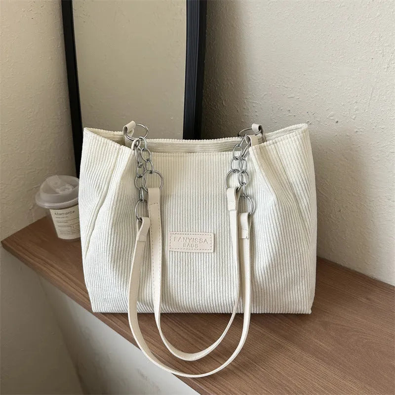 Corduroy one-shoulder tote handbag in black, white or brown with three-dimensional pocket