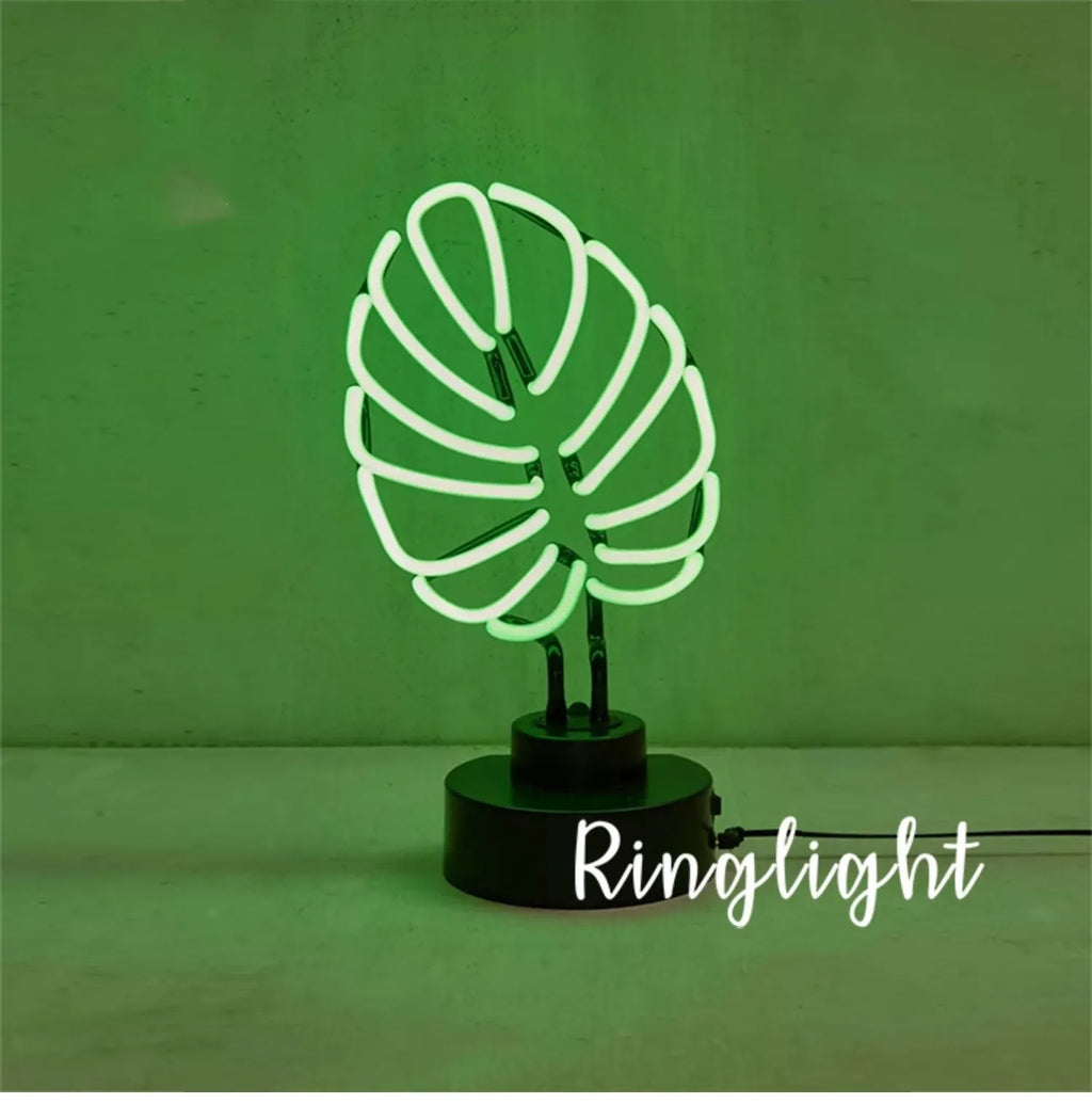 White bamboo-shaped desk lamp with green light, showing USB cable and two size options.