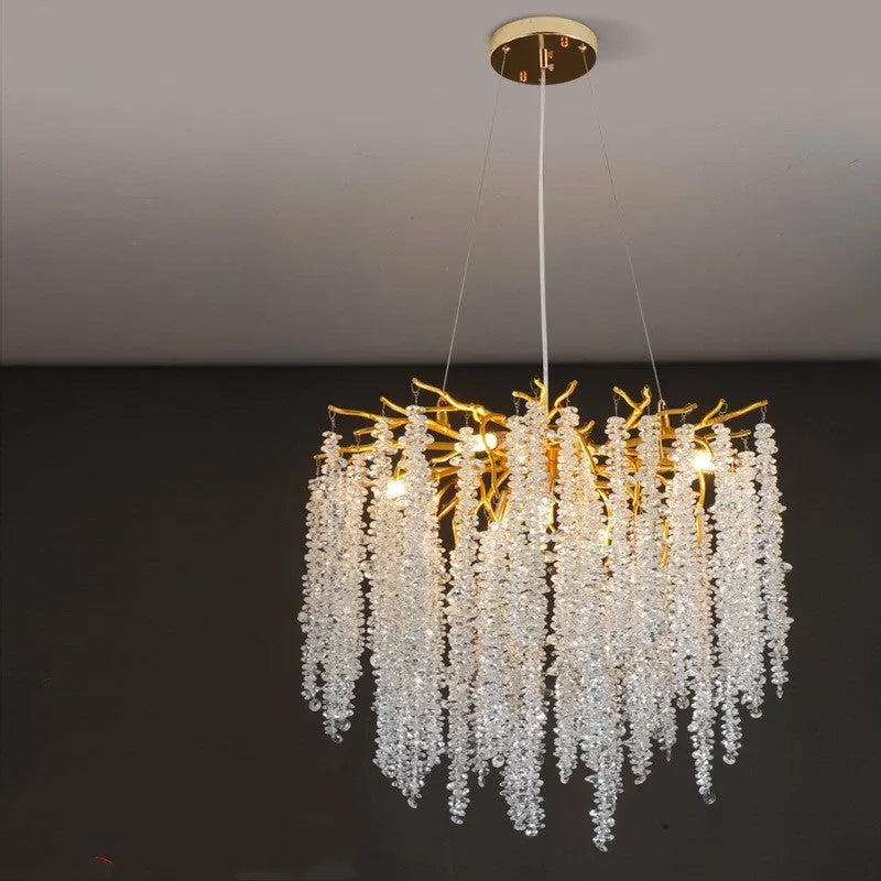 Modern crystal chandelier with adjustable chain and LED lights in a light luxury style.
