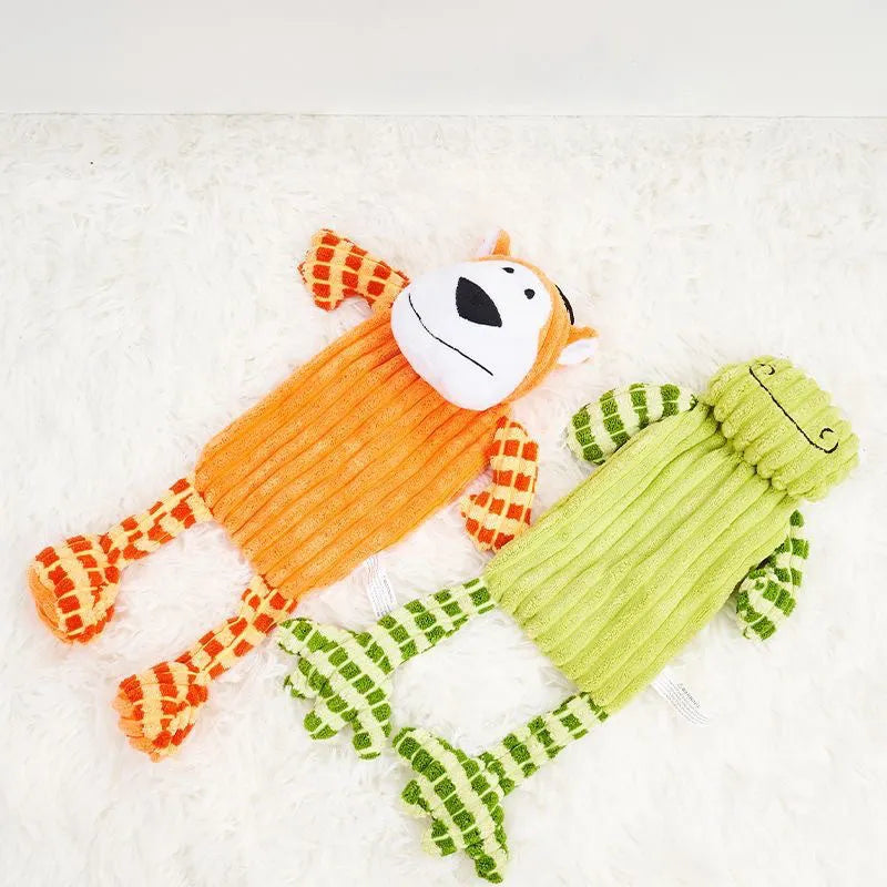 Green and orange immortal squeaker plush dog toy for aggressive chewers with reinforced stitching