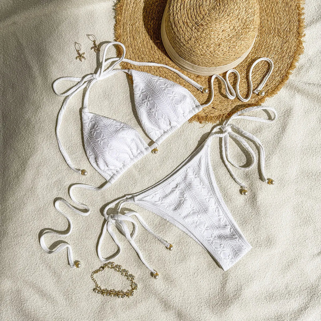 Women's halter lace-up bikini swimsuit in polyester fabric shown in milky white colour