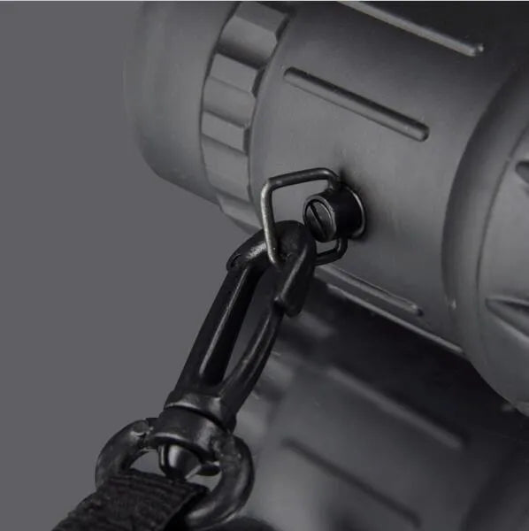 Black 16x52 monocular telescope with 52mm objective lens and green film coating for high-definition observation