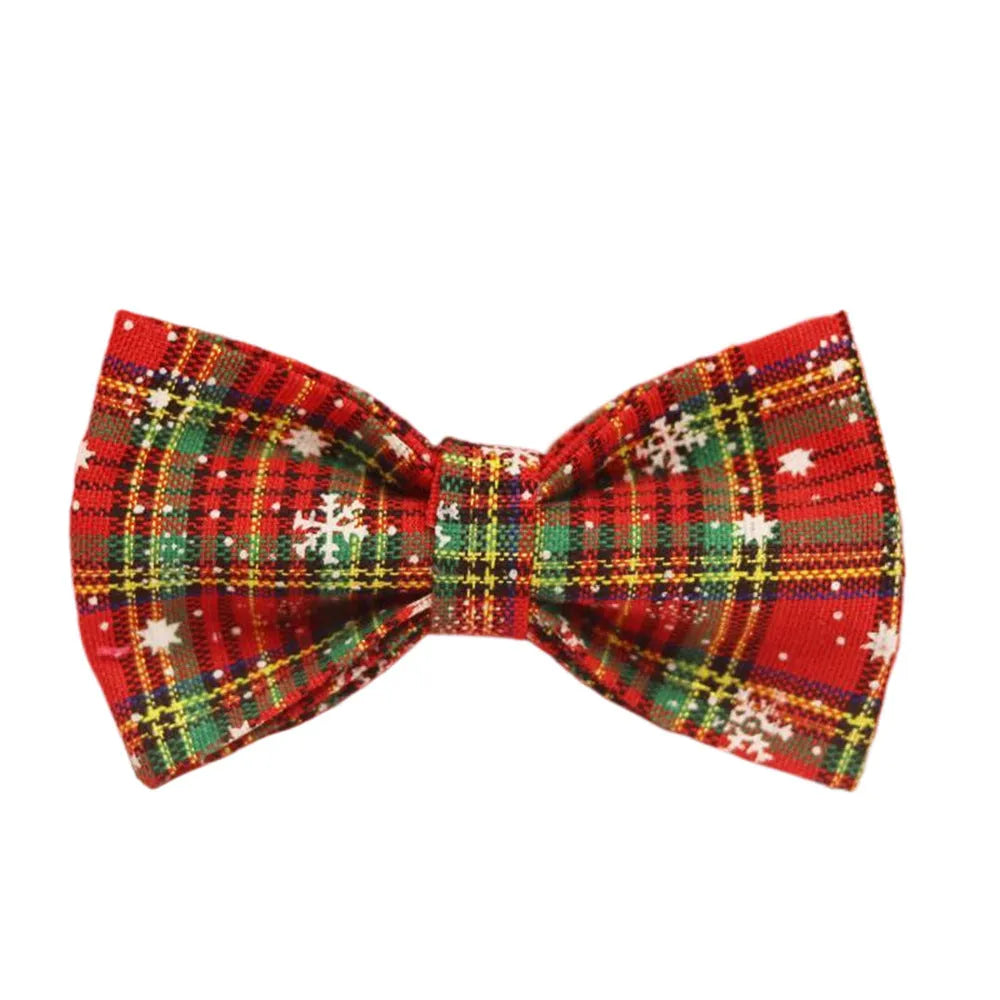 Red snowflake Christmas dog collar and leash set with plaid design and decorative bow on dog vest