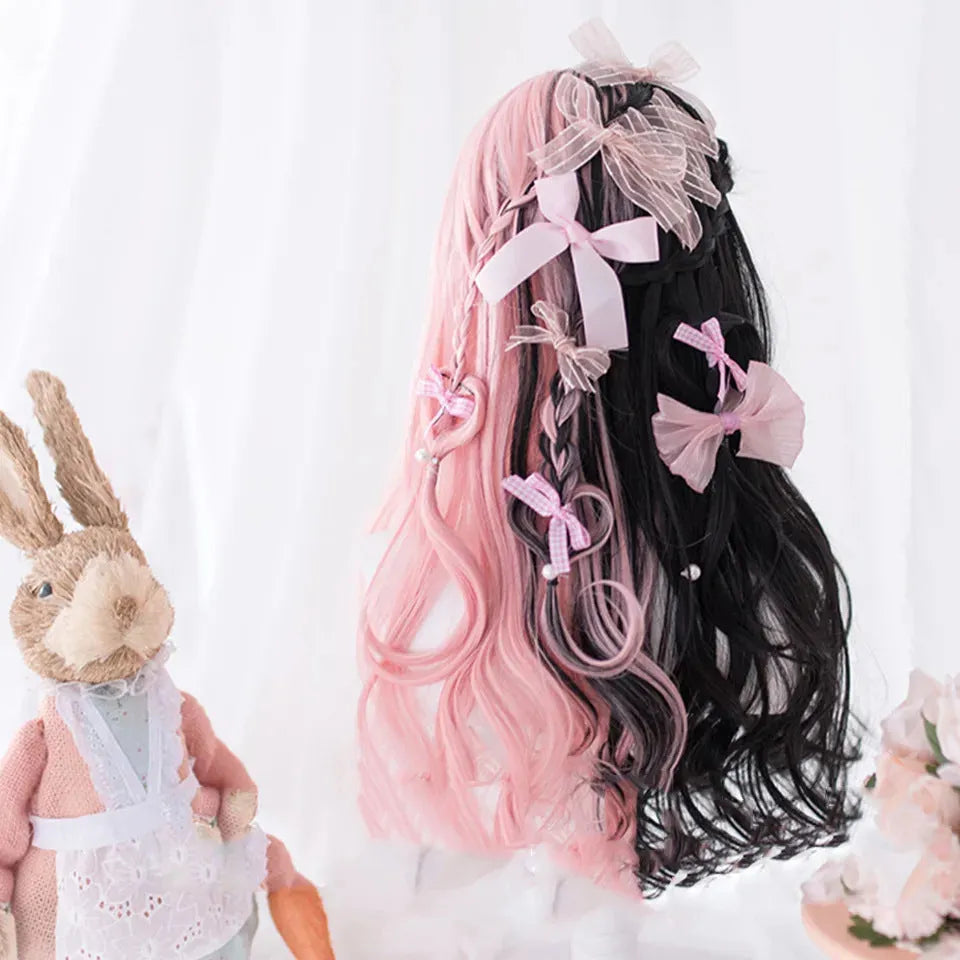 Harajuku Japanese Lolita long curly black and pink wig with full fringe, shown on a model.