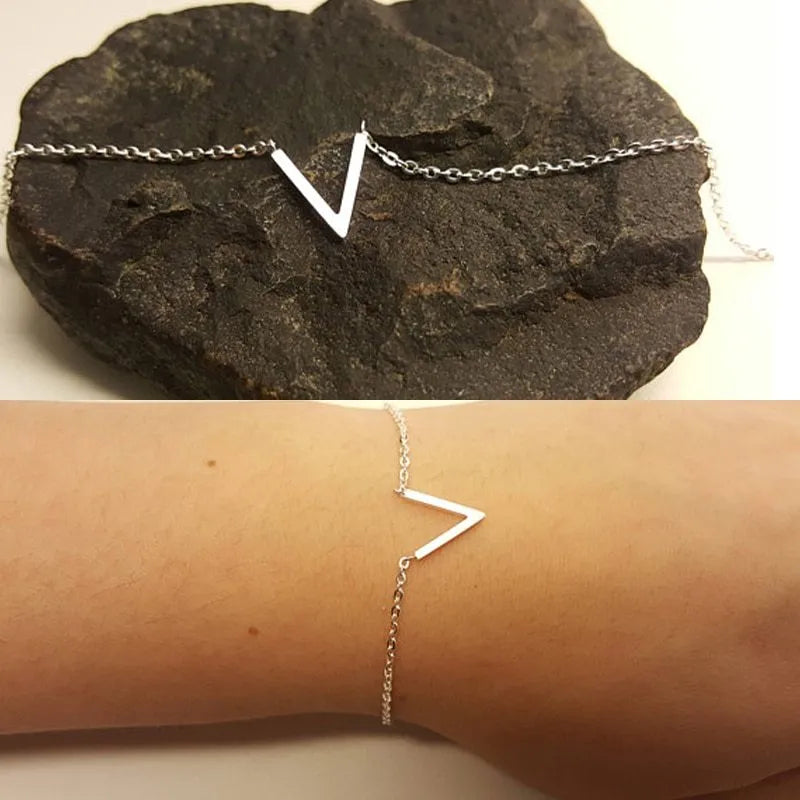 V-shaped stainless steel chain bracelet for women in gold or silver geometric design.