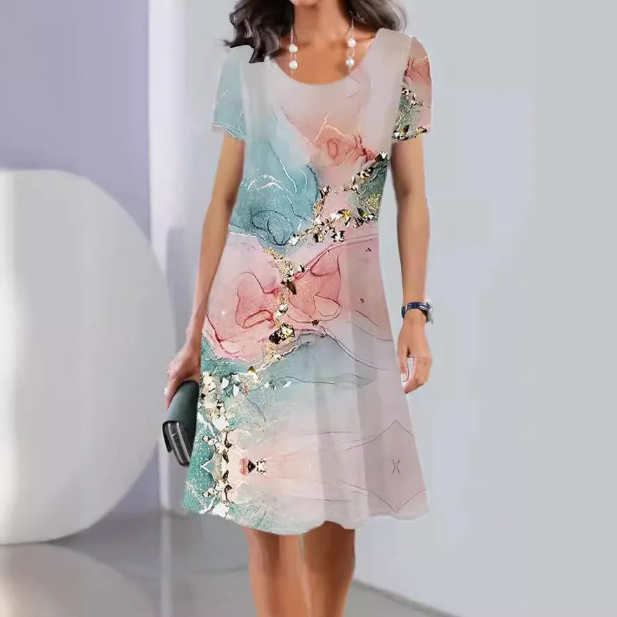 A woman's mid-length floral print summer dress with short sleeves and a round neck, shown in Element 3 colour.