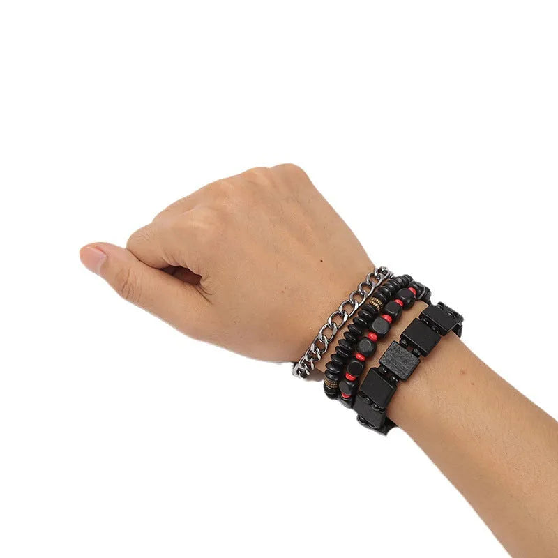 Retro woven alloy men's beaded bracelet set with four different coloured bracelets on a white background