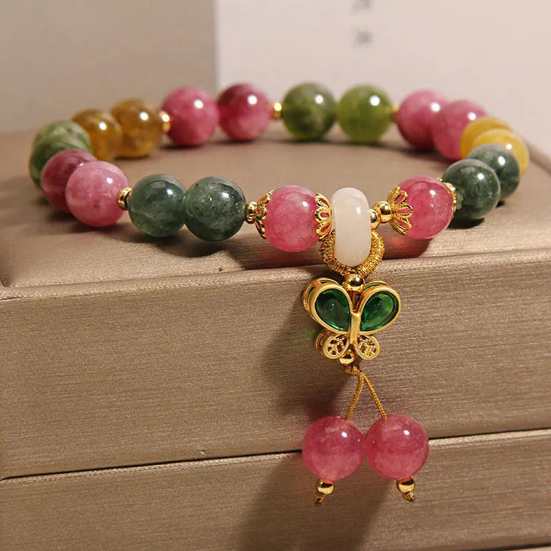 Butterfly pendant bracelet with colourful tourmaline gemstones in alloy setting and rhinestone accents