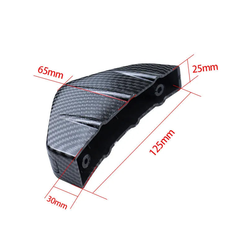 Black triangular car rear spoiler on a white background, shown with screws and adhesive tape.