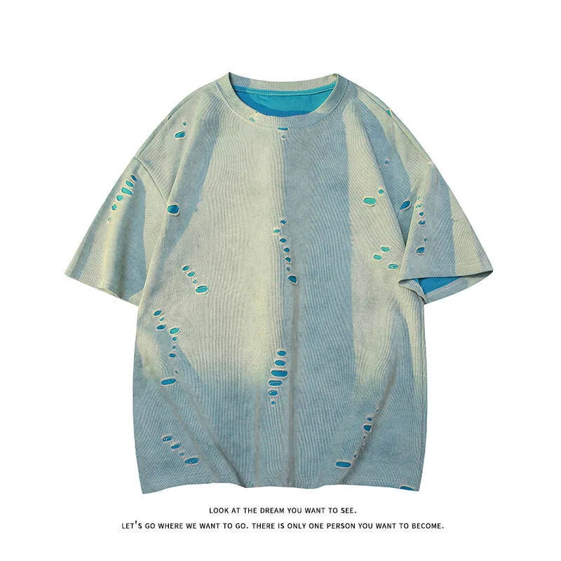 Men's blue loose fit cotton blend T-shirt with ripped detail on short sleeve, laid flat.