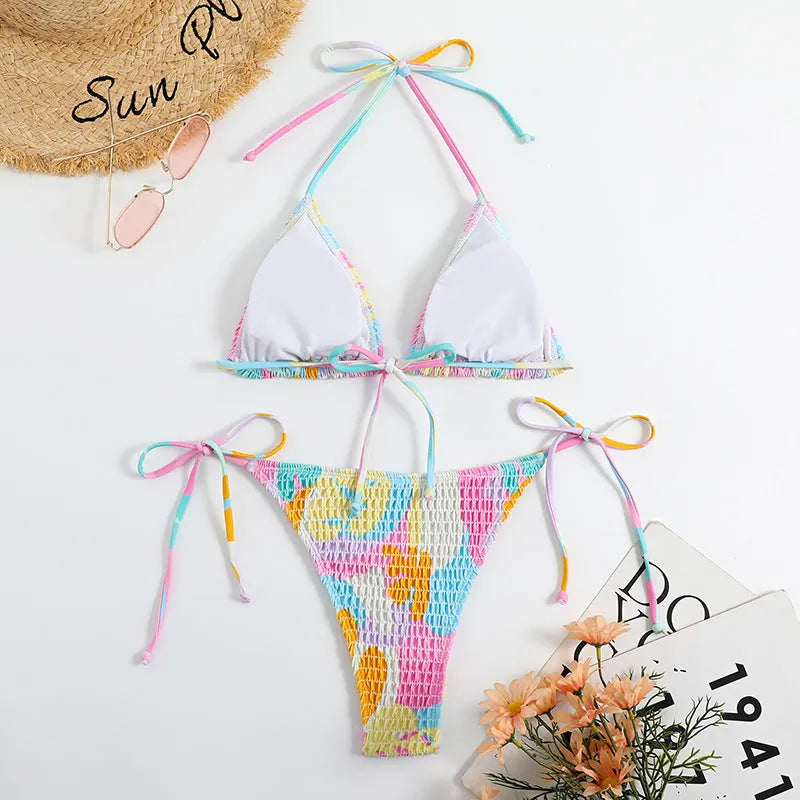 Multicolour floral printed women's triangle bikini with smocking craft details on the fabric.