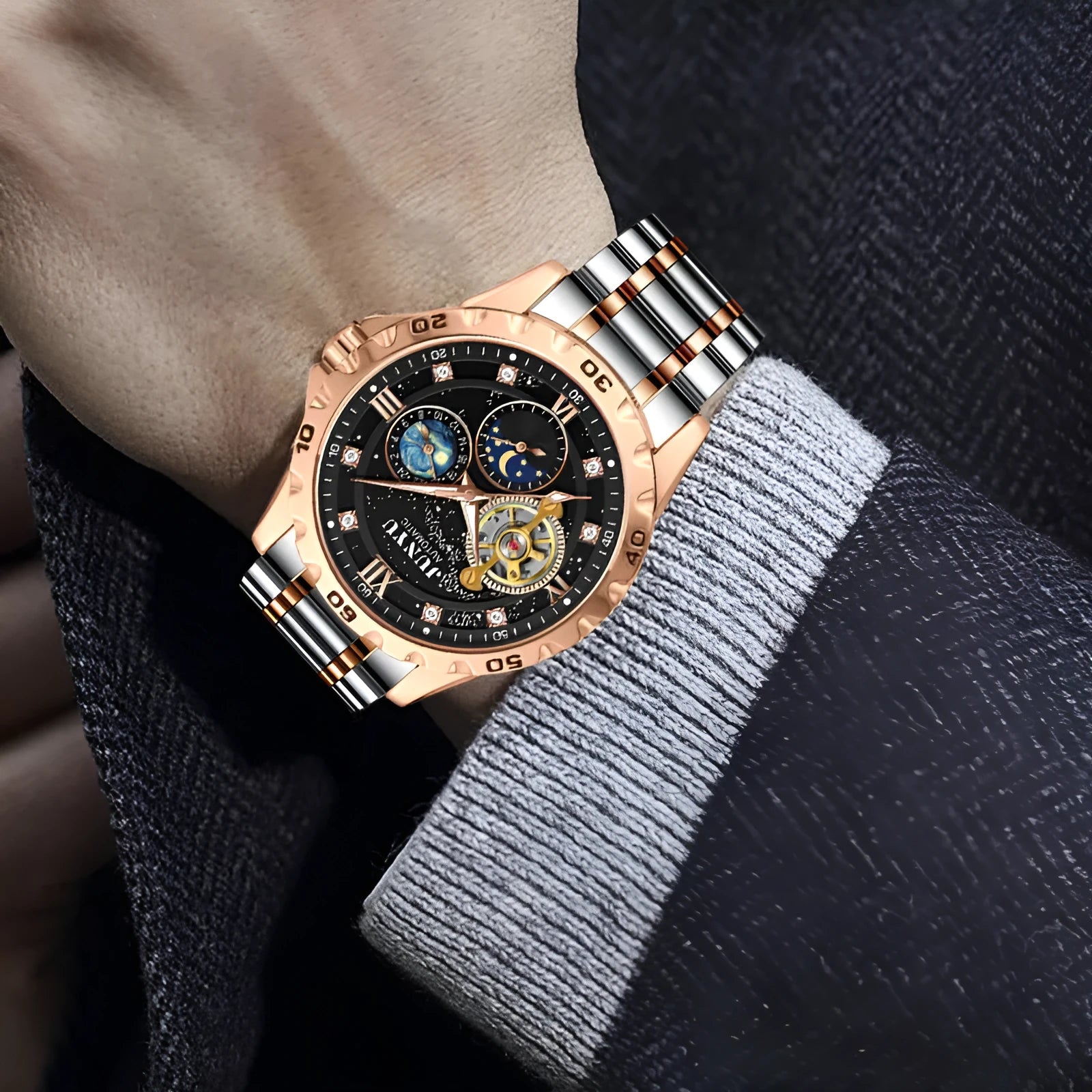Men's automatic mechanical watch with luminous hands on a starry sky dial in a rose gold case.