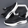Men's Fly Woven Mesh casual shoes in grey and green, showing low-top design and rubber sole.