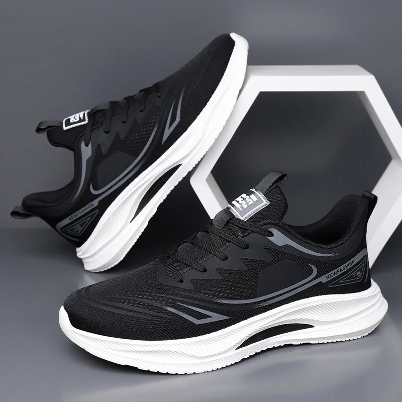 Men's Fly Woven Mesh casual shoes in grey and green, showing low-top design and rubber sole.