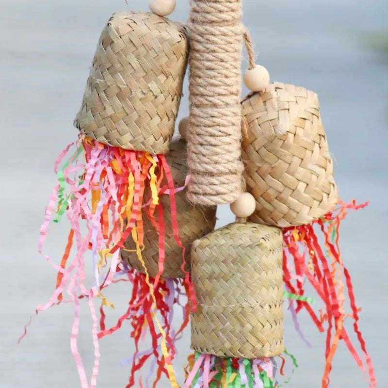 Colourful wooden shredded paper parrot chewing toy with sisal rope hanger