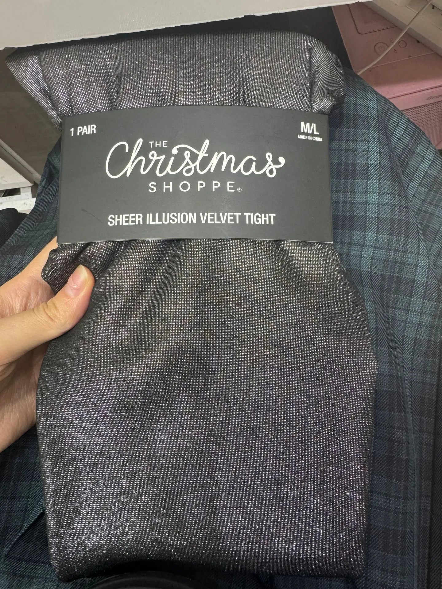 Women's anti-snagging thermal leggings in black and coffee colours showing wool lining and footed style.
