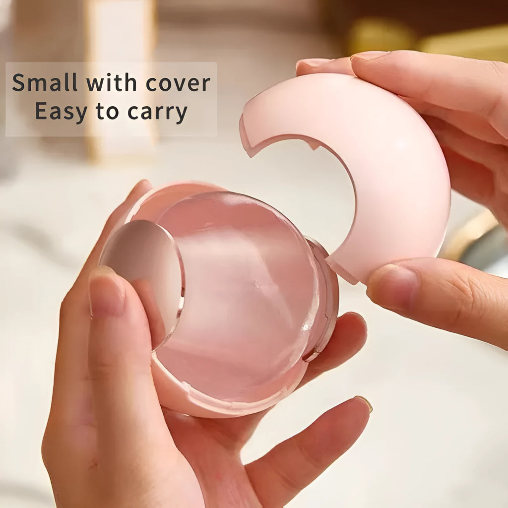Reusable ABS hair removal ball lint roller in pink, showing handle and sticky roller surface.