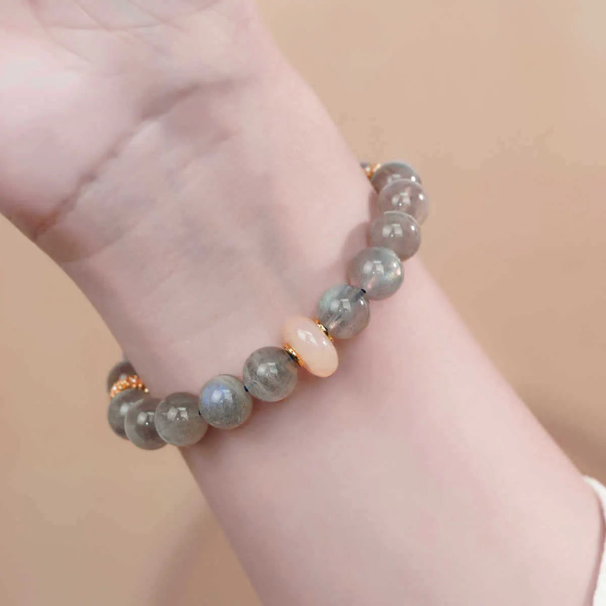 Gray moonstone women's half bracelet with 8mm round beads on wrist