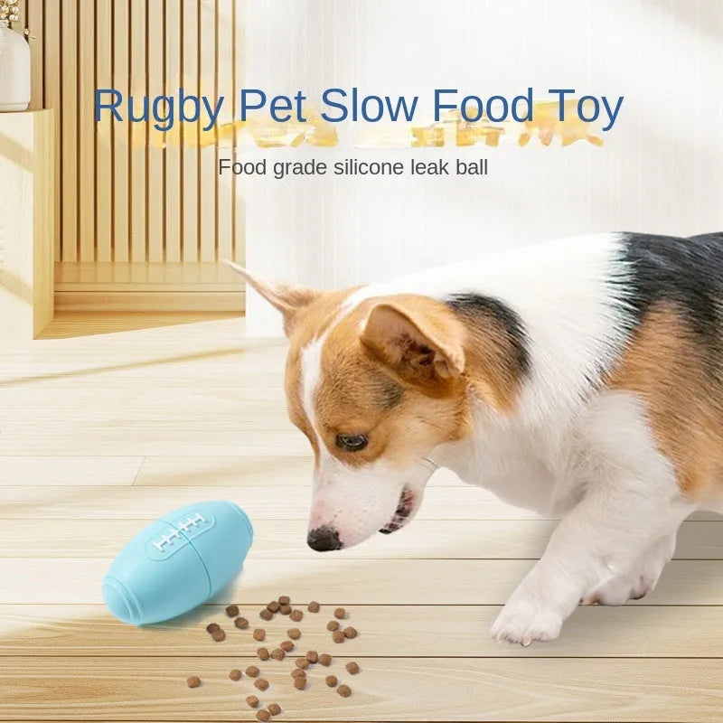 Blue silicone rugby ball shaped dog chew toy for boredom relief and interactive feeding.