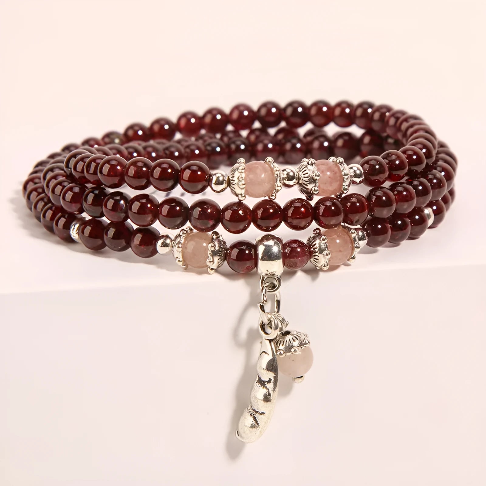 Original wine red garnet crystal flower bracelet with bohemian and ethnic design elements