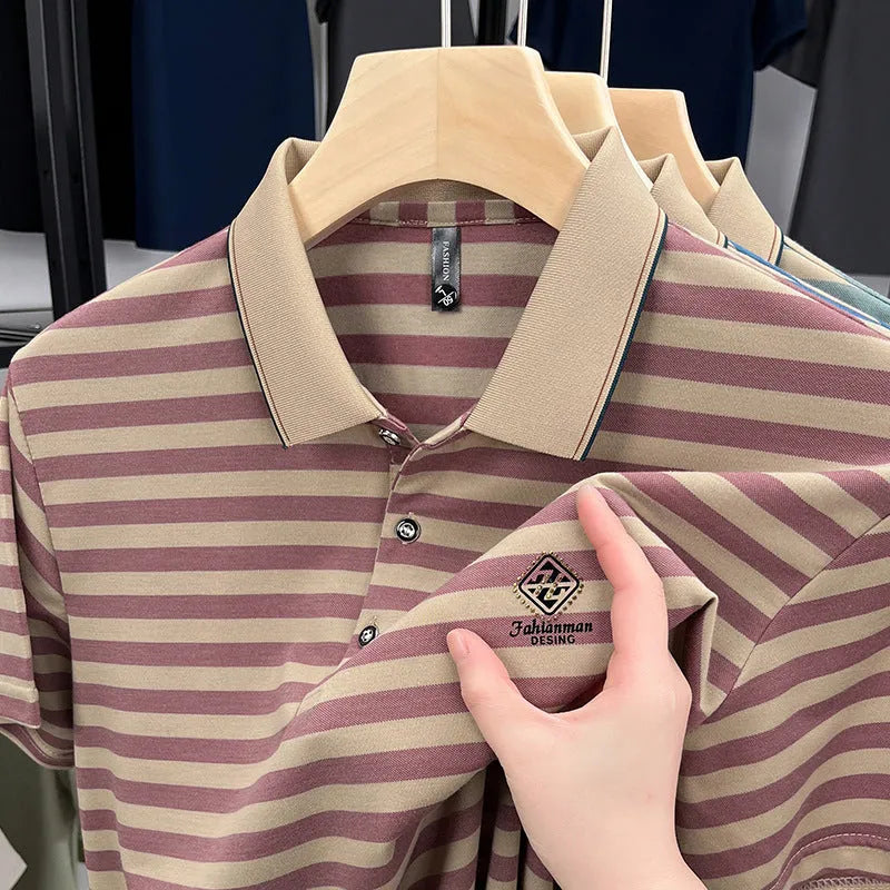Man wearing a red and white mosaic striped short sleeve casual polyester top.
