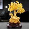 Citrine-coloured resin money tree Feng Shui ornament with a small water turtle design.