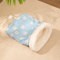 Flannel cat sleeping bag nest in pink Trojan or blue rabbit design, 50 by 40 cm.